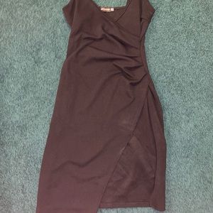 Black pretty little thing body con wrap dress! Size 8